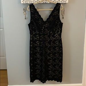 Black sleeveless lace dress with nude lining
